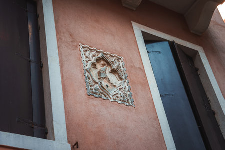Beautiful Pink Building with Ornate Door and Window in Unspecified Locationの写真素材