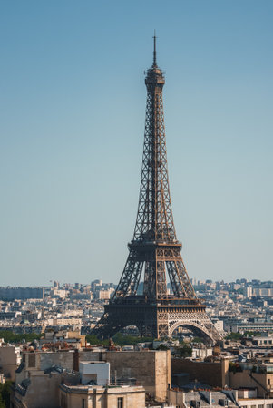 Daytime shot of the Eiffel Tower under a clear blue sky in Paris, France.の写真素材