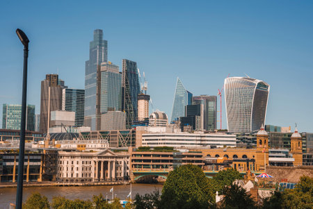 Skyscrapers with clear blue sky in background at London on sunny day