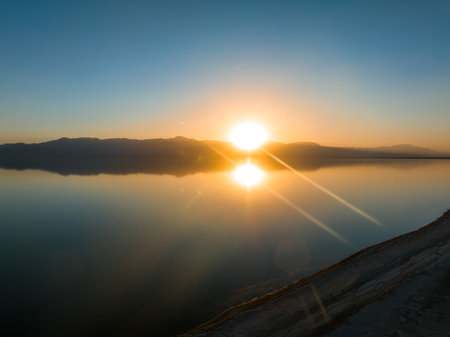 Aerial view over Salton sea in California. Huge lake in the middle of a desert at sunset.の写真素材