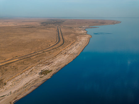 Aerial view over Salton sea in California. Huge lake in the middle of a desert at sunset.の写真素材