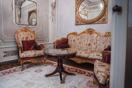 Luxurious and elegant room with ornate furniture and mirror, timeless interior design concept.の写真素材