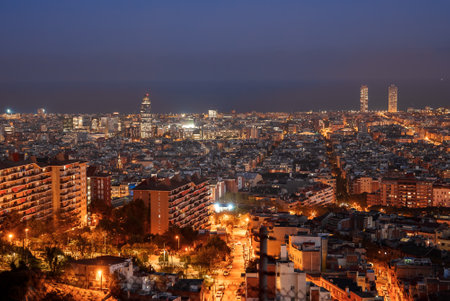 Twilight Panorama of Barcelonas Illuminated Skyline and Landmarksの写真素材