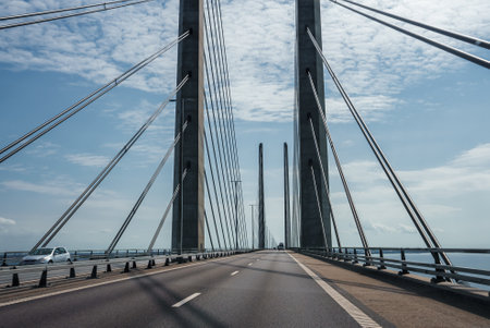 Modern Oresund Bridge Connecting Copenhagen and Malmo on a Clear Dayの写真素材