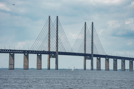 Oresund Bridge Connecting Copenhagen and Malmo on an Overcast Dayの写真素材