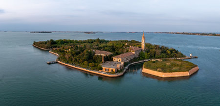 Aerial view of the plagued ghost island of Poveglia in the Venetian lagoon