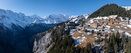 Aerial view of Murren, Switzerland, showcases a serene mountain villageの写真素材