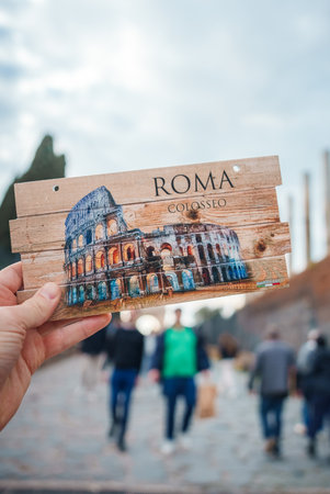 Rome Colosseum souvenir postcard with wooden background