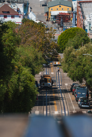 Iconic San Francisco Scene Cable Cars on Steep Streetの写真素材