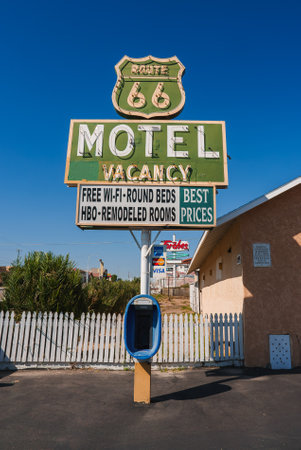 Vintage Route 66 Motel Sign and Payphone Booth, Barstow, USAの写真素材