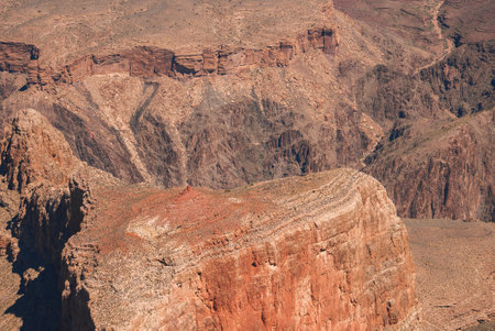 Rugged Canyon Landscape with Rock Formation, Desert Vistas, Grand Canyon Style, Warm Lighting.の写真素材