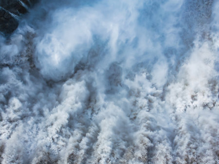 Aerial View of Snowy Mountain Range and Glacier in Icelandの写真素材