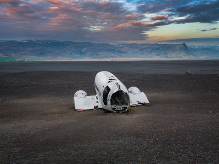 Wrecked old plane Dakota on the black sand beach, south coast of Icelandの写真素材