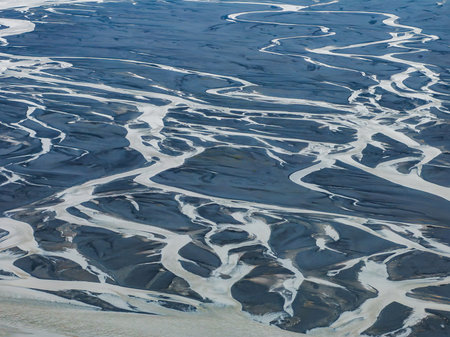 Aerial View of River Delta with Intricate Waterways in Icelandの写真素材
