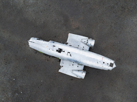Wrecked old plane Dakota on the black sand beach, south coast of Icelandの写真素材