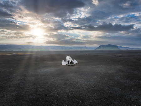 Wrecked old plane Dakota on the black sand beach, south coast of Icelandの写真素材