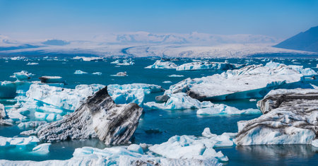 Aerial View of Glacial Landscape with Icebergs in Icelands Pristine Watersの写真素材