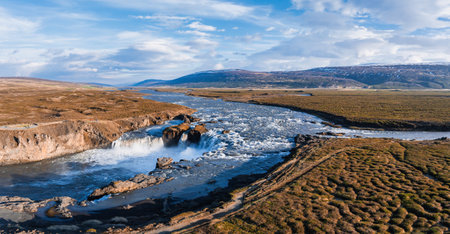 Aerial view of the powerful Godafoss waterfall on a sunny day in Northern Iceland.の写真素材