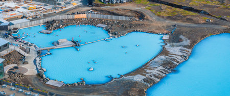 Aerial View of Blue Lagoon and Volcanic Rock in Icelands Geothermal Landscapeの写真素材