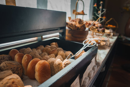 Luxurious Breakfast Buffet with Freshly Baked Bread Rolls in High-End Hotelの写真素材