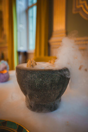 Luxurious Dining Experience with Dry Ice Presentation in Elegant Settingの写真素材