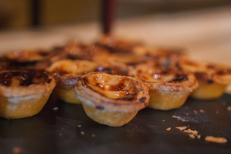Close-Up of Freshly Baked Pasteis de Nata with Golden-Brown Caramelized Tops