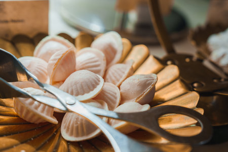 Luxurious Dessert Display with Shell-Shaped Confections in Elegant Setting