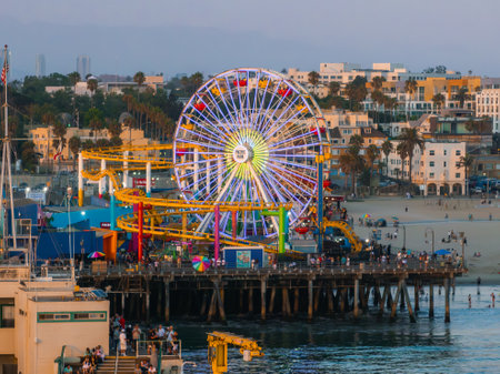 Santa Monica Pier with Ferris Wheel and Roller Coaster in Californiaの写真素材