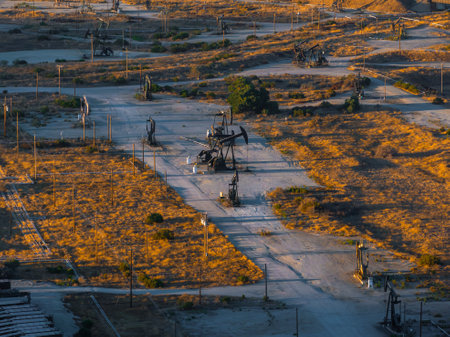 Aerial View of Oil Rigs in California Desert at Duskの写真素材