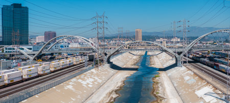 Aerial View of Los Angeles River with Urban Skyline and Bridgesの写真素材