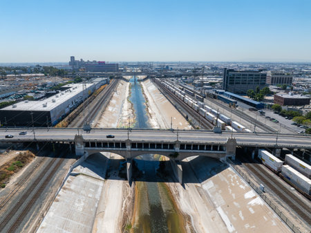 Aerial View of Los Angeles River with Bridge and Urban Landscapeの写真素材