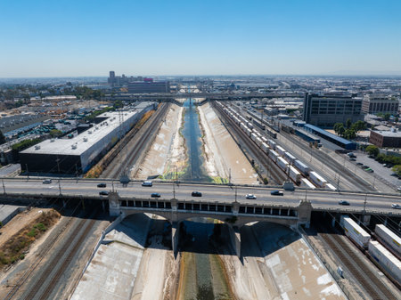 Aerial View of Los Angeles River with Bridges and Industrial Areaの写真素材