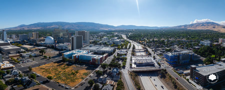 Aerial View of Reno, Nevada with High Rises and Mountain Backdropの写真素材