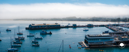 Aerial View of Monterey Harbor with Boats and Foggy Shorelineの写真素材