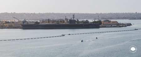 Aerial View of Aircraft Carrier Docked at San Diego Harbor
