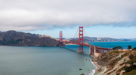 Golden Gate Bridge with Coastal Fog and Marin County Hillsの写真素材