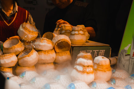 Street Food Stall with Coconuts in Shanghai Marketの写真素材