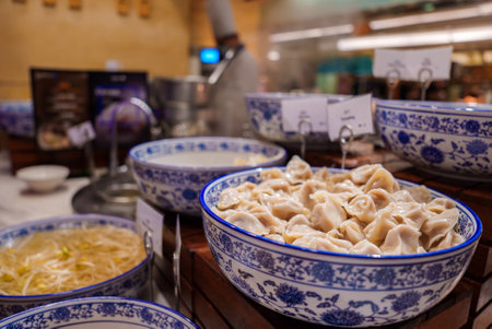 Traditional Chinese Dumplings in Ornate Porcelain Bowl in Shanghaiの写真素材