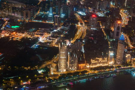 Nighttime Aerial View of Shanghais Bund and Skyscrapers