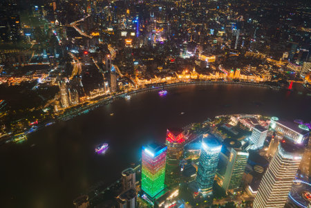 Nighttime Aerial View of Shanghai with Bund and Skyscrapers