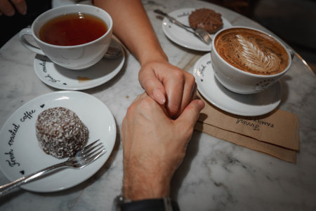 Cozy Cafe Scene with Beverages and Dessert in Helsinki, Finlandの写真素材