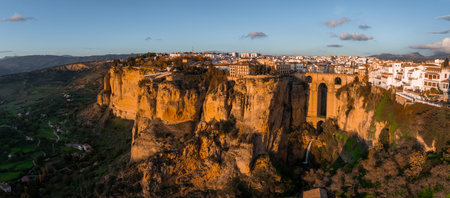 Aerial View of Ronda, Spain at Sunset Featuring Puente Nuevoの写真素材