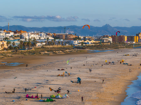 Aerial View of Tarifa Beach with Kite Surfers and Whitewashed Buildingsの写真素材