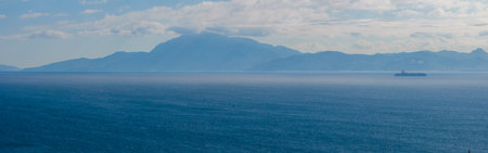 Panoramic View of the Strait of Gibraltar with Cargo Ship