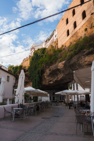 Street Scene with Rock Overhangs in Setenil De Las Bodegas, Spainの写真素材