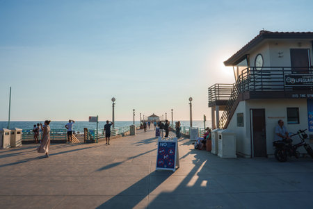 Manhattan Beach Pier at Sunset with Lifeguard Station in Viewの写真素材