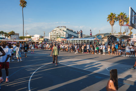 Crowd Gathers Around Basketball Court at Venice Beach, Los Angeles