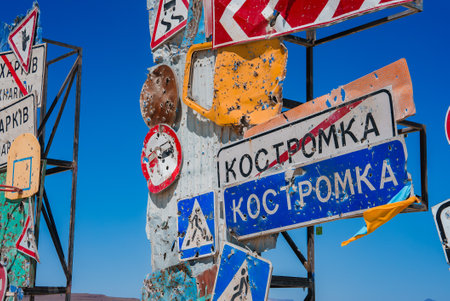 Collection of Bullet Riddled Road Signs in Desert Settingの写真素材