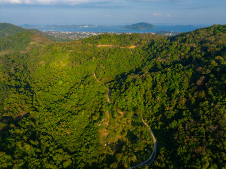 Aerial View of Lush Green Hills and Coastline in Phuket, Thailandの写真素材