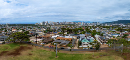 Aerial View of Residential Area and Skyline in Honolulu, Hawaiiの写真素材